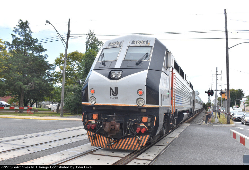 PL42AC # 4024 pushing a westbound out of PPB Station toward Bay Head